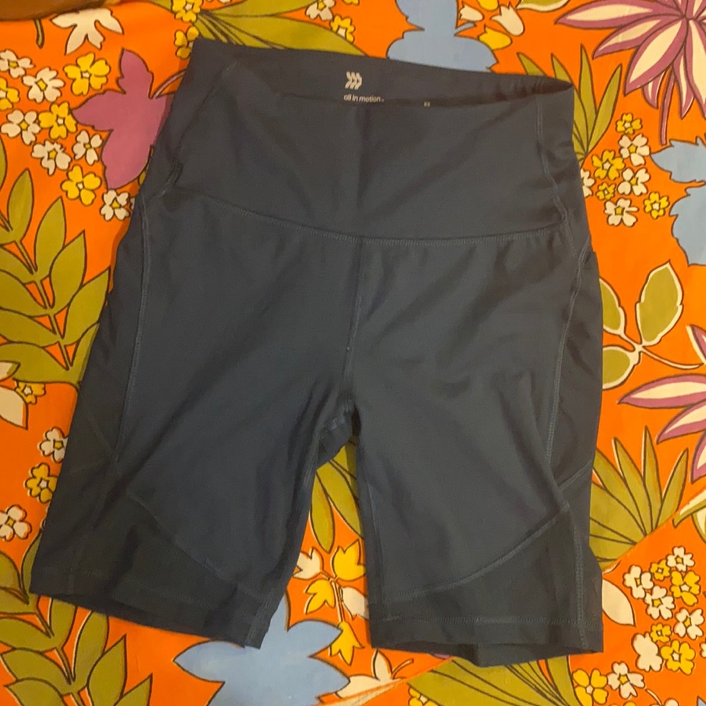 Teal blue biker shorts with pockets